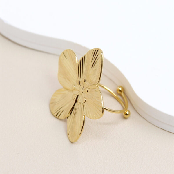 bague-ajustable-en-acier-inoxydable-avec-design-de-fleur-elegante_dore_66f099b77f5e7